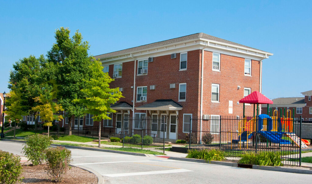 Clinton Peabody building exterior with playground.