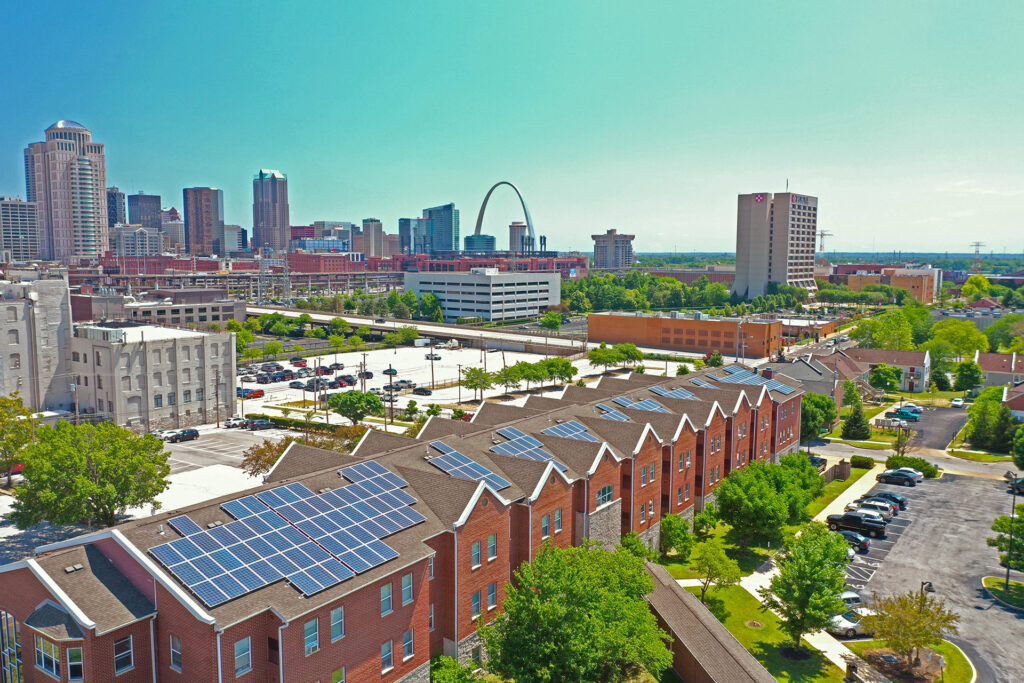 Les Chateaux property aerial shot with St. Louis downtown in the background.