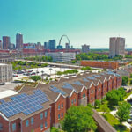 Les Chateaux property aerial shot with St. Louis downtown in the background.