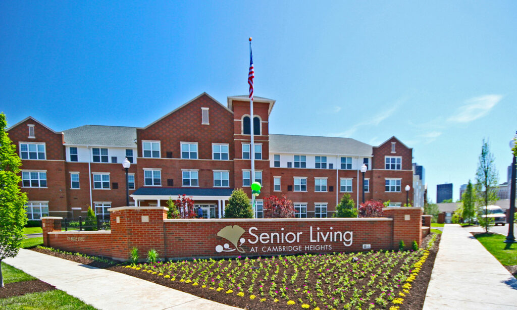 Senior Living at Cambridge building exterior with entrance signage.
