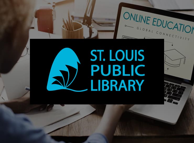 Woman using laptop to view St. Louis Public Library - Online Learning.